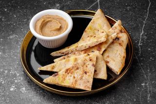 Фокача з сушеними томатами та часником (100/20г)