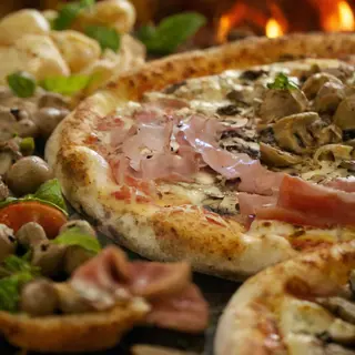 Pizza prosciutto e funghi
