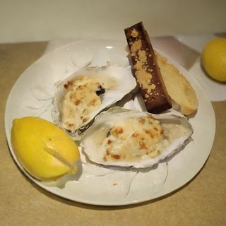 Запечені устриці у сирному соусі