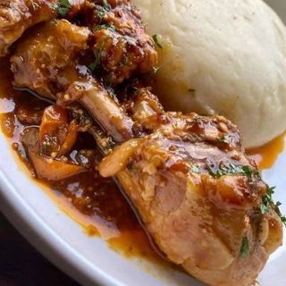 Semolina served with traditional chicken 