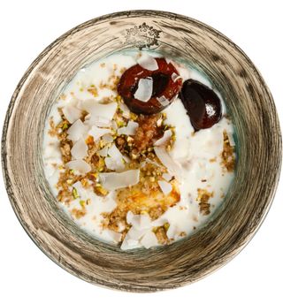 Сирники з кокосовим соусом та фісташками (320 г)