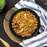 Paella De Habas Y Alcachofas