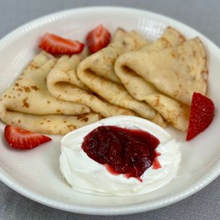 Crepes with sour cream and jam