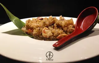 Riso saltato con pesce misto