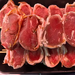 Solomillo de cerdo marinado rellenado con bacon