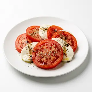 Tomates Con Mozzarella Y Orégano