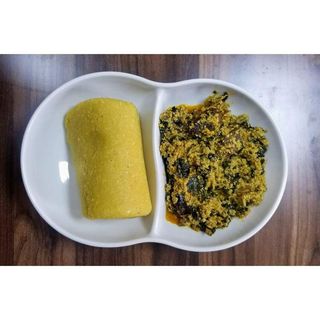 Egusi Soup + Garri + Goat Meat