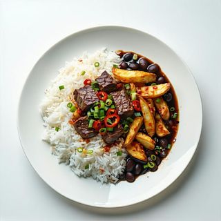 Taku Taku con lomo saltado