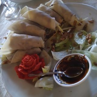 Pato laqueado pekinés con crepes