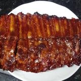 Flaming BBQ Rack of Ribs American (Costillar BBQ) más 1 patatas y 1 bebida
