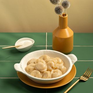 Пельмені з курятиною та сметаною