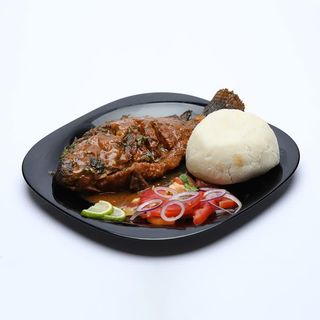 Small-size fish wet fry with ugali and kachumbari