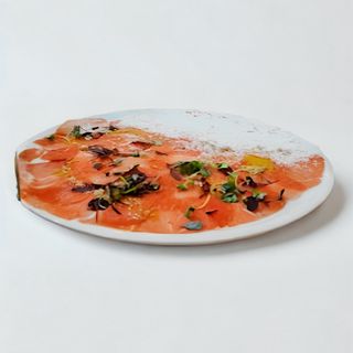 Carpaccio de ternera al parmigiano
