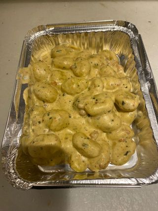 Gnocchi al pesto con boloñesa