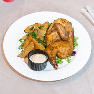 Jumătate de pui gătit la jar