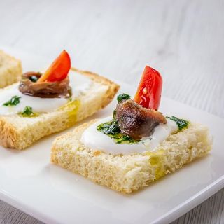Acciughe del mar Cantabrico con crostini e burro