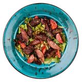 Салат з курячою печінкою, пармезаном та грушею в червоному вині (200г)