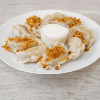 Pierogi z kurczakiem serem i pieczarkami