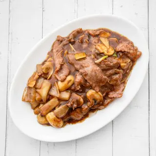 ternera con champiñones