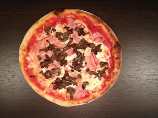 Prosciutto e funghi