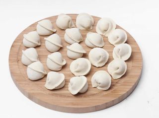 Пельмени из говядины с курицей (0,8 кг.) DAMDI (полуфабрикат)