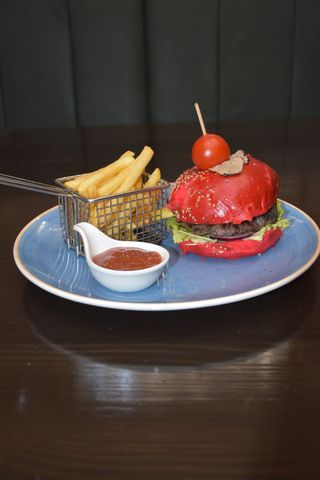 Truffle beef burger with truffles and porcini sauce & French fries
