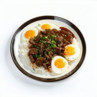 Arroz Con Tenera Y Huevos En Salsa