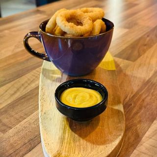 > AROS DE CEBOLLA REBOZADOS (10 a 12 aprox)