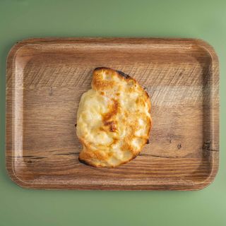 Calzone con prosciutto cotto, mozzarella e ricotta