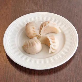 18) Ravioli di gamberi e zenzero in pasta d'orzo e fecola di patate