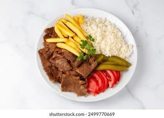 Pura Carne De Ternera Con Arroz Y Patatas