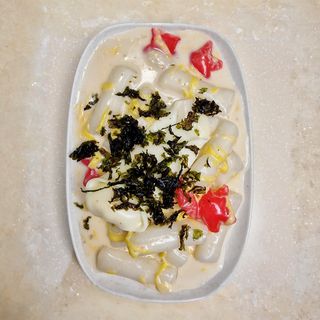 Ттокпокки в сливочном соусе