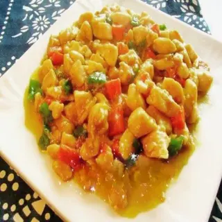 64.  Pollo al curry amarillo estilo China