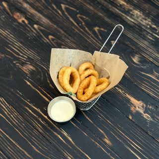 Цибулеві кільця + соус	(100/30г)