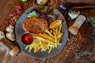 Chicken schnitzel with French fries