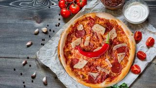 Pizza Carolina Ø32cm + Pepsi