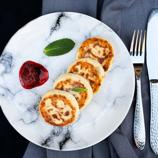 Cottage cheese pancakes (Syrniki) with raisin
