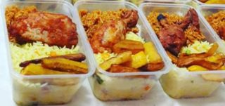 Jollof rice and fried rice plantain and chicken 