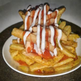 Ración De Patatas Bravas