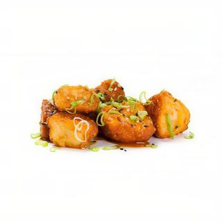 Spicy pollo karaage con cebolleta y shichimi