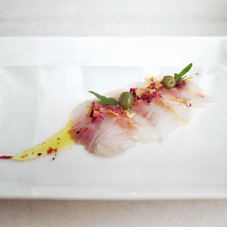 711. Carpaccio branzino