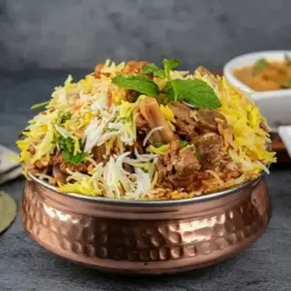 Mutton Dum Biryani (500grm) with Raita (DUM = Charcoal Smoked) Must Try