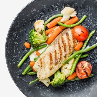 Тилапія з овочами