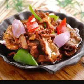 Ternera Salteada con salsas ostras