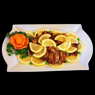 90 Pato Con Salsa De Limón