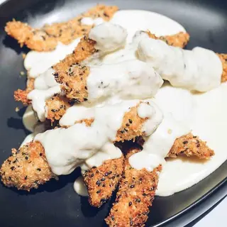 Lagrimitas De Pollo Con Salsa De Quesos