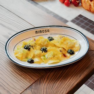 Равіолі з кроликом в соусі з білого вина та чорним часником (210г)