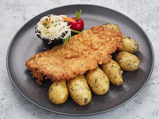 Kotlet schabowy Відбивна з свинини та молода картопля (350g)
