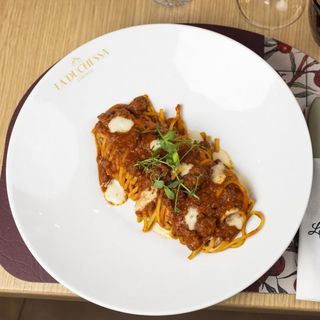 LINGUINE AL RAGU STROLGHINO
