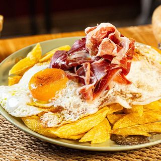 Jamón ibérico y cama de trufa 